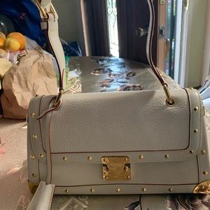 LV Le Talentueux purse